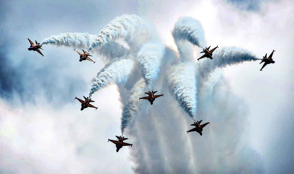 The Singapore Airshow...epa04068174 An aerial display of the Rep