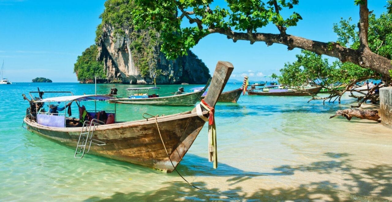boat wooden canoe local thailand beach holiday experience2