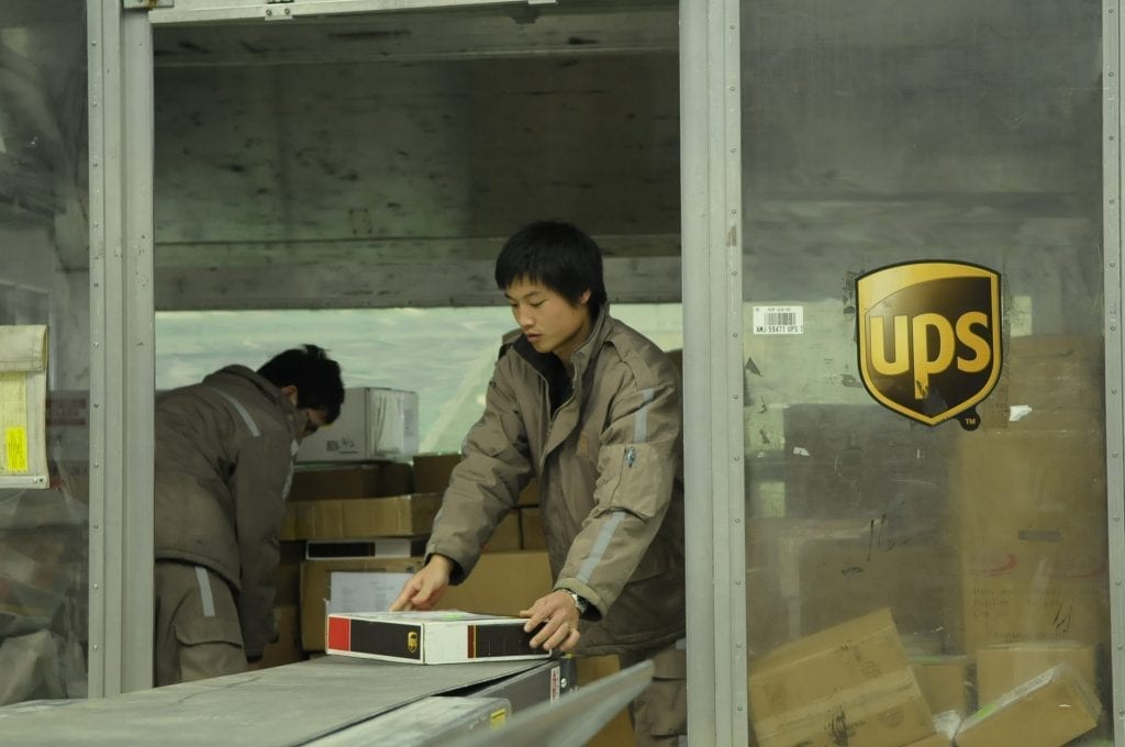 Staff-loading-a-UPS-aircraft-container-in-Shanghai-China-bound-for-export-1024x680.jpg