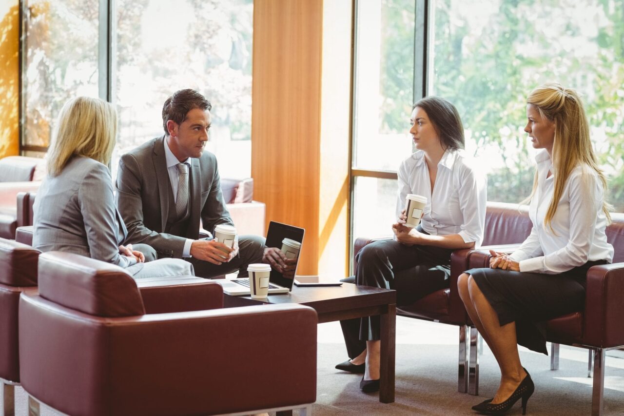 Business People Talking and Working Together