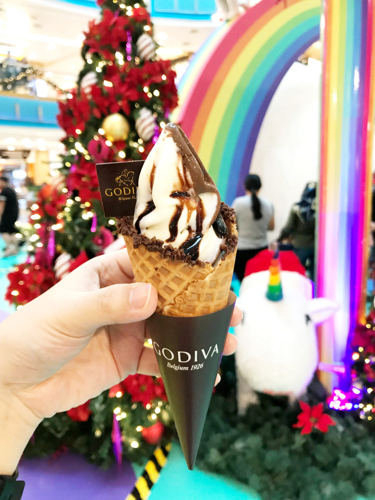 To sweeten up your rainbow journey, grab a Godiva Soft Serve Ice Cream at the Godiva Booth!